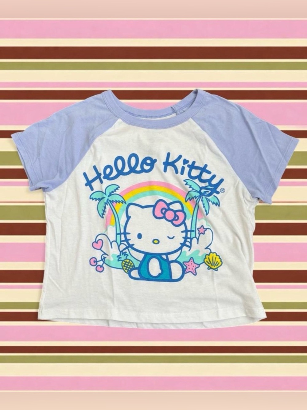 Sanrio Hello Kitty baby tee with Hello Kitty graphic featuring a rainbow, palm t